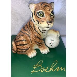 Tiger Woods‎ Foundation tiger figurine with ball. 2018